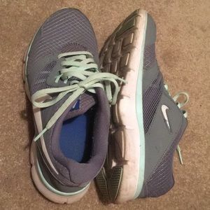 Gently used size 8.5 gray Nike sneakers